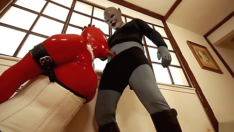 Sexy shemale with big tits takes off latex and sucks dick